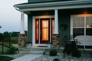 Home exterior with glass-paned door